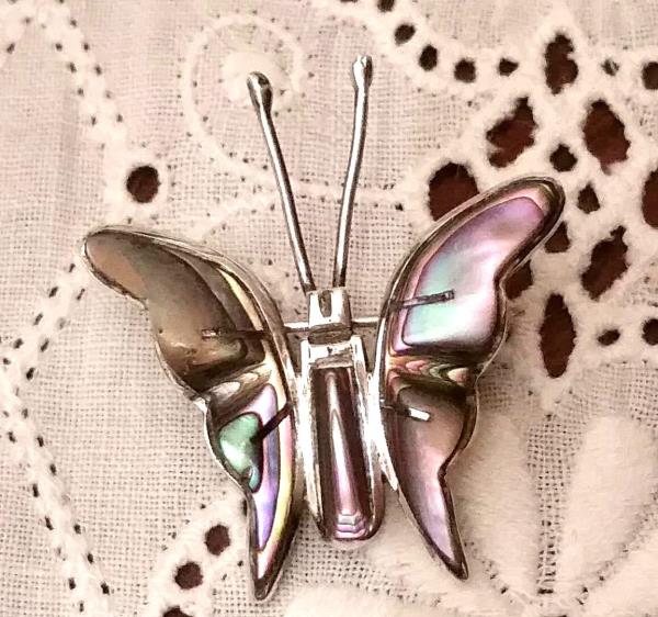 Sterling pendant with moth in jar